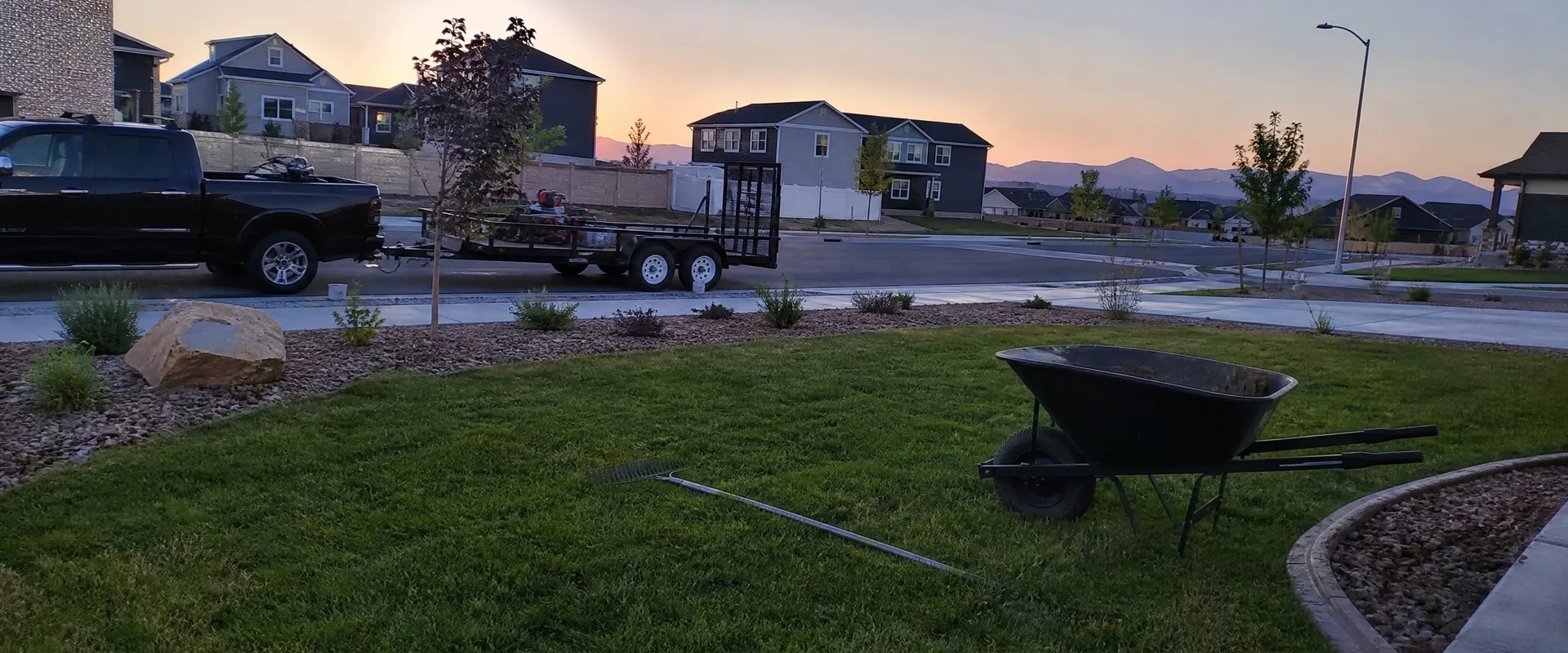 YLC Landscaping crew completing new-construction landscape installation on a Utah property