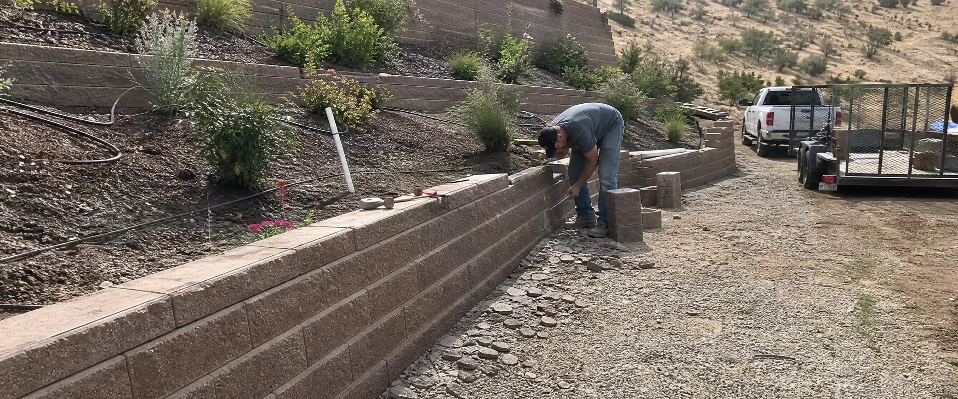 YLC Landscaping crew completing retaining walls on a Utah property