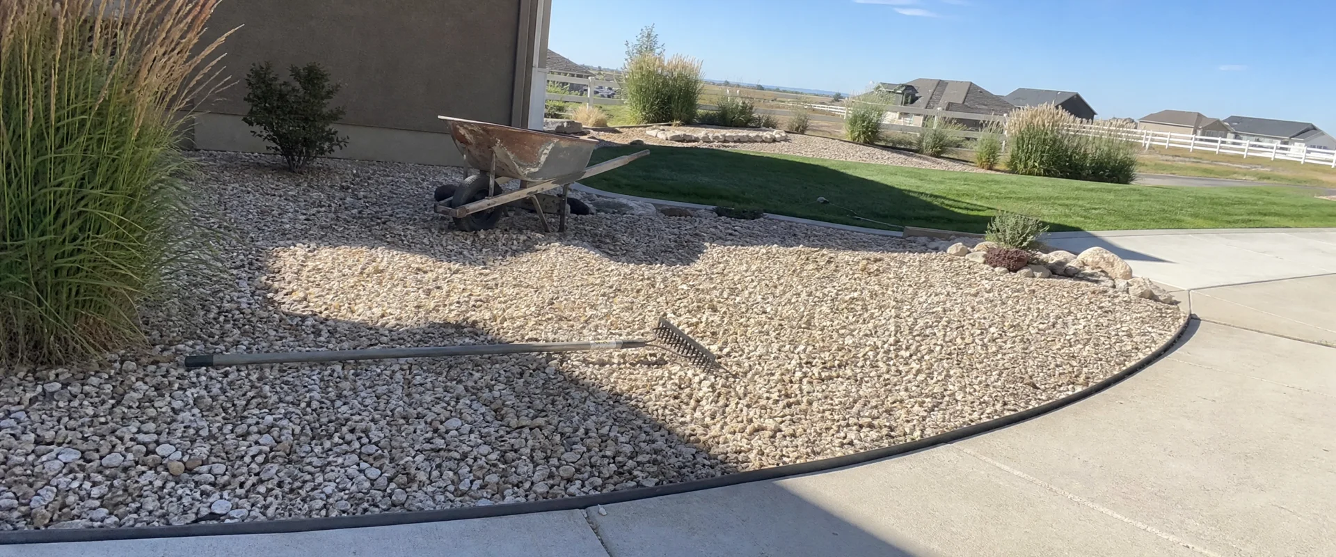 YLC Landscaping crew completing gravel & edging on a Utah property