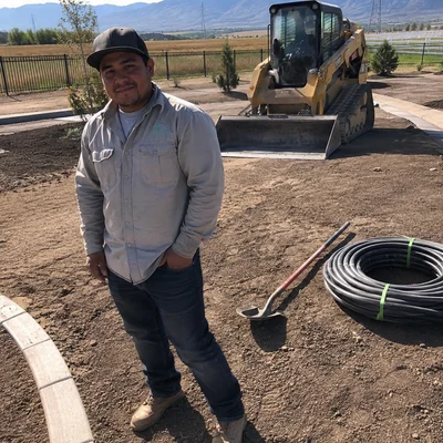 Yovani E., owner and lead landscape contractor at YLC Landscaping, on a job site in Grantsville, Utah